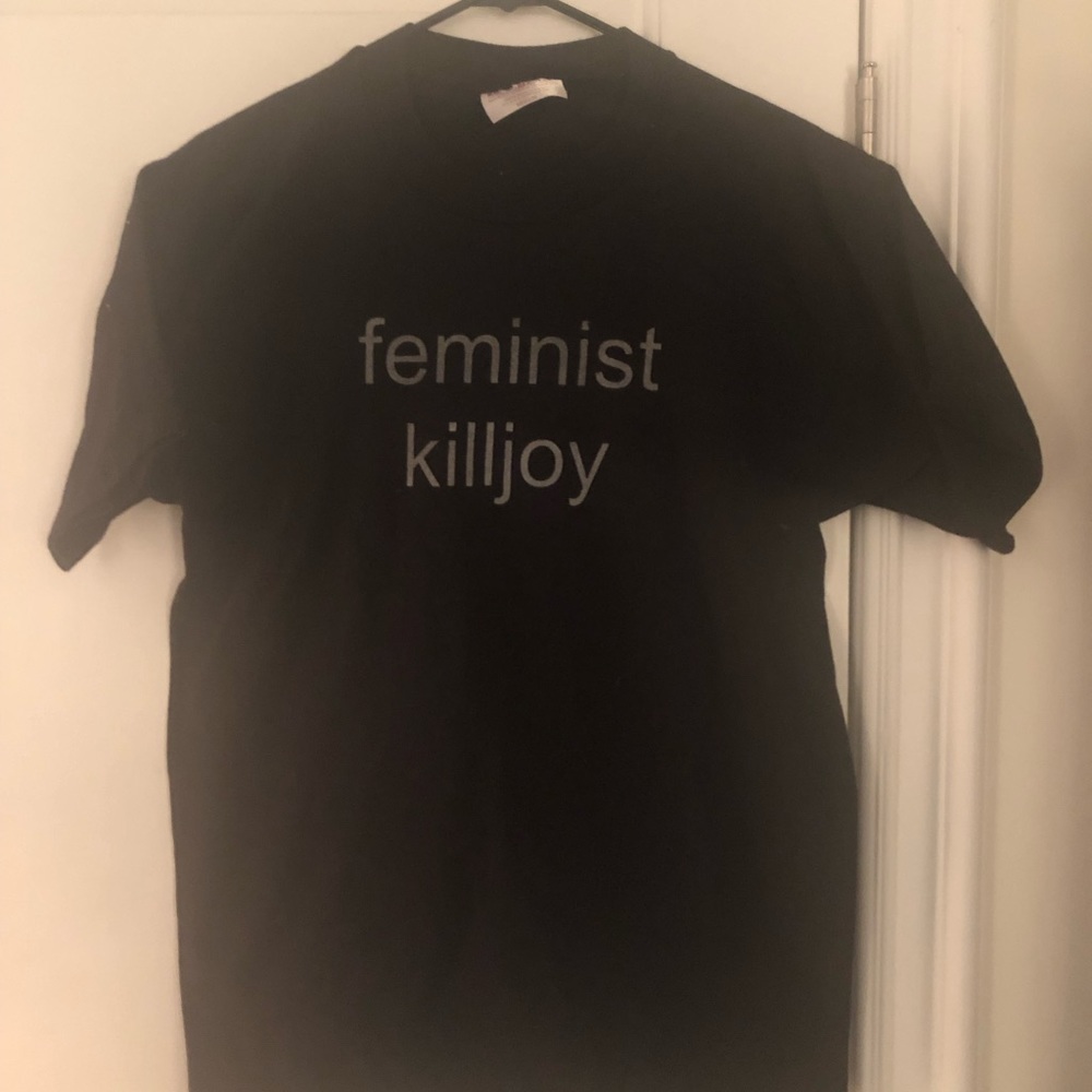 Black T-shirt with white text - “feminist killjoy”